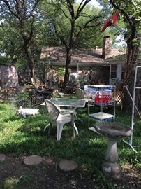 The back yard is a treasure trove of garden art