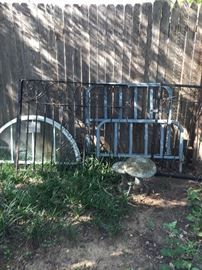 Vintage metal gates and railing, windows, metal twin bed