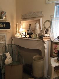 Painted mantle, painted tin tile shelf, old crocks, twig chair, silver plate cruet set with milk glass bottles, iron pieces, books