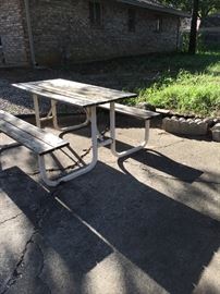 Picnic table, concrete edgers and bricks