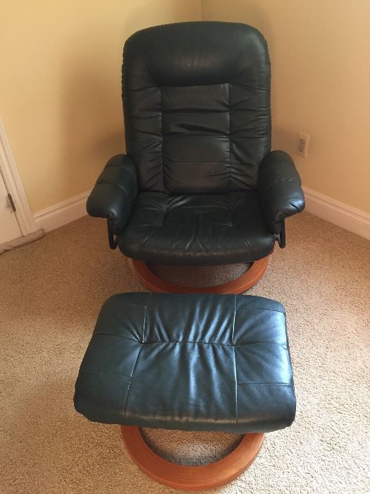 Hunter green leather chair and ottoman 