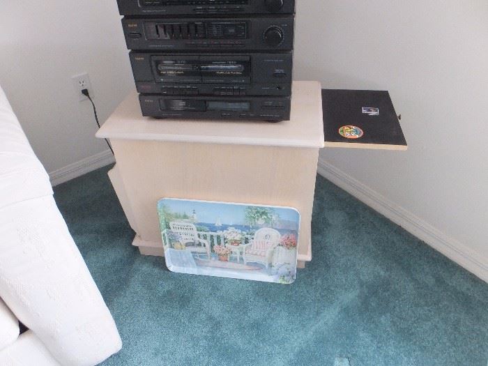 side table with pull out beverage tray, storage inside and magazine rack 