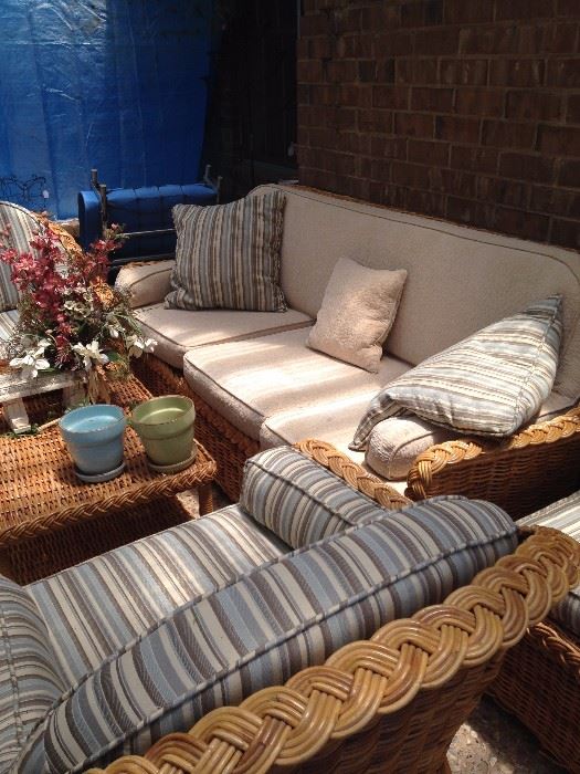 Rattan sofa, 2 chairs, coffee table, and 2 ottomans 