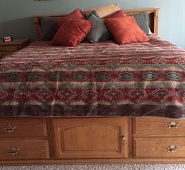 Oaktree Bedroom Suite King Size:
Platform Bed with Underbed Storage
Dresser w 3-Piece Mirror and Cedar Lined Drawers
Nightstand
Jacquard Quilt w Bed Skirt and Shams
King Mattress Only