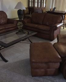 Leather Sofa
Leather Loveseat
Leather Chair and Ottoman
Coffee Table Slate Edge, Beveled Glass, Metal Base
Slate Edge, Beveled Glass, Metal Base End Table (2)
Ceramic Table Lamp