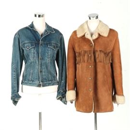 Women's Casual Jackets Including Calvin Klein and Fibok: A selection of two women’s casual jackets. This grouping includes a Calvin Klein denim jacket with a medium wash, brass tone buttons, and two breast pockets. Also included, a light brown leather Fibok jacket with a wide collar, tassel accents, button front, side slash pockets, and an off-white shearling lining.