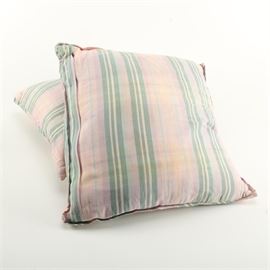 Plaid Pattern Down Pillows: A pair of down pillows. These two pillows feature a pink, purple, green, and blue plaid pattern upholstery. Each is unmarked.