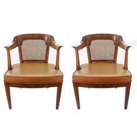Pair of Vintage Henredon Armchairs: A pair of vintage armchairs by Henredon. Each chair features a cane back, curved crest rail, curved armrests, padded vinyl upholstered seat, and four tapered legs. The chairs are marked “Henredon Fine Furniture” on the bottom. Items match 17LAX169-003 and 17LAX169-004.