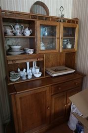 Nice cabinet. The kitchen, den, garage and yard will be offered at the second sale.