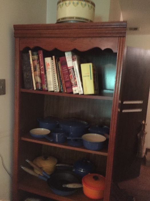 A group of good cookbooks and a large assemblage of Le Creuset French cookware, enamel on iron.  All in excellent condition and most appears to be never used.