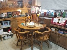 Hardwood Table with 2 leaves and 6 barrel back spindle chairs