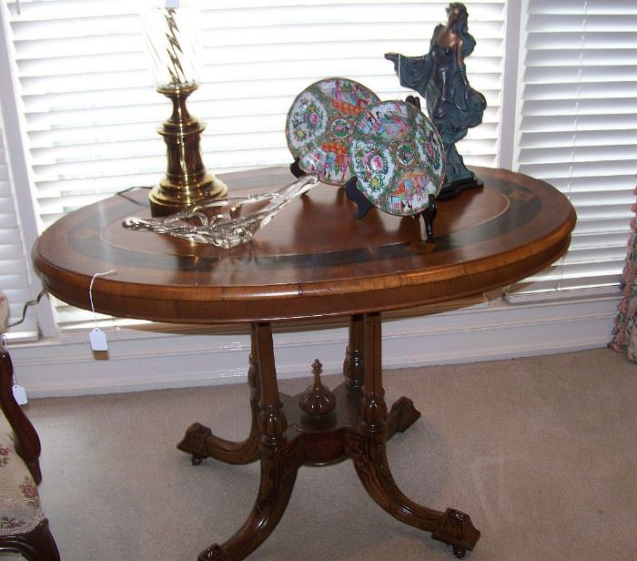 Outstanding antique table with gorgeous graining and decor on surface