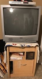 old school TV and small table with little storage