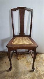 Wood occasional chair with cane seat