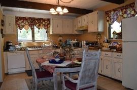 Dining Table,  Kitchen Items, Toaster, Crusinart Blender, Baking Pans, Cake decorating Items