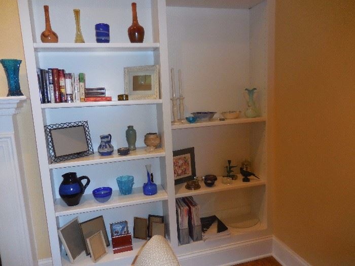 Living Room, Built in Shelves, Hand Blown Mid Century Glass. Books, Pottery..