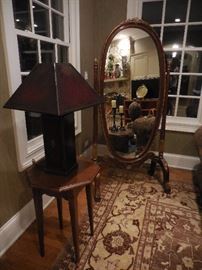Jeffco Hand Carved Mahogany Swing Mirror with Gold Leaf. Purchased at Tina Haan Gallery In Barrington. Matilaind Smith Leather Lamp(SOLD)