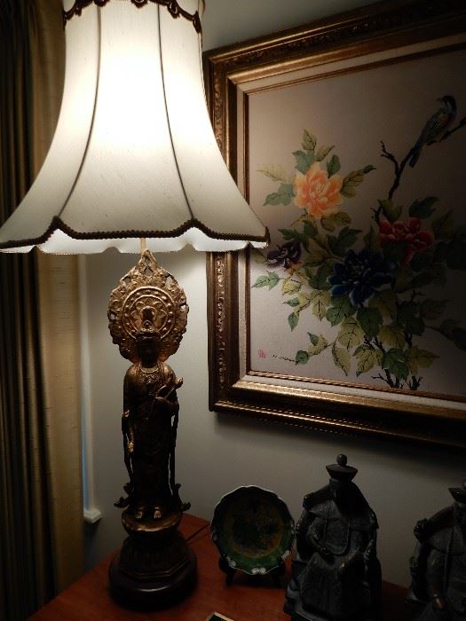 THIS LAMP IS SO HEAVY AND BEAUTIFUL--COULD BE BRASS OF BRONZE.