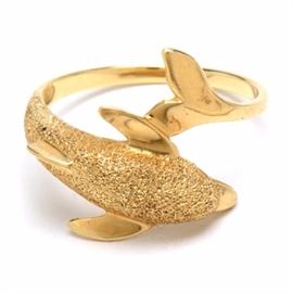 14K Yellow Gold Dolphin Ring: A 14K yellow gold ring designed as a leaping dolphin with contrasting rough and polished finish.