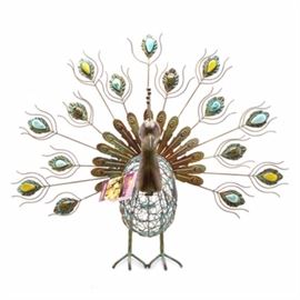 Handcrafted Peacock Cork Caddy: A handcrafted metal peacock cork caddy with polished stone and enamel embellishments. Two-part constructed with open metal wire body, hinged neck and fanned metal feathers. The peacock retains original label from “Picnic Plus”.