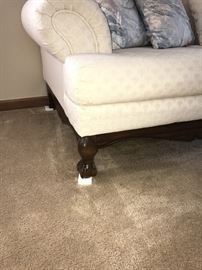 CREAM SOFA WITH WOODEN BALL AND CLAW FEET