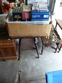 VHS TAPES ON SMALL SIDE TABLE