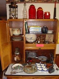 Recipe Books, Vintage Butter Churn, Insulators, Roseville Pieces, Vintage Canister Set (Red)...(Cabinet in photo not for sale)