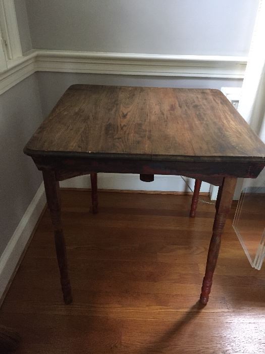 Antique folding wooden sewing table.