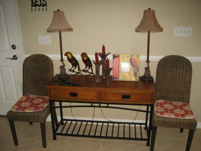 matching wicker chairs, designer lamps & table