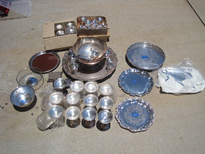 Silverplate punch bowl and 35 cups,  silverplate trays, and champagne flutes with glass liners...liners are rare!