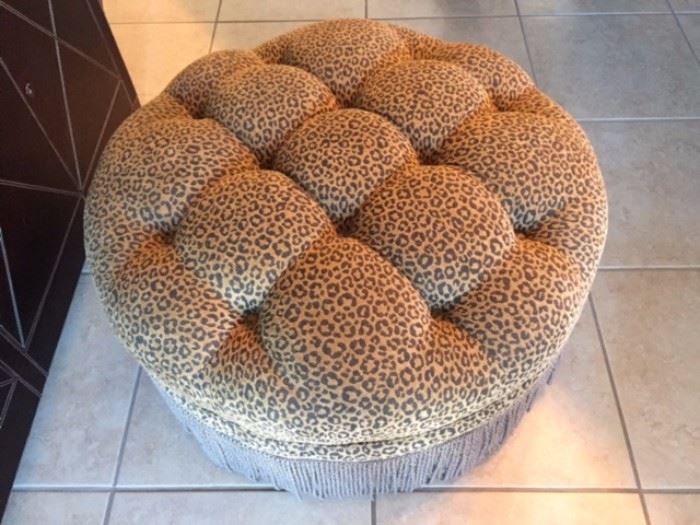 tufted leopard print and fringed ottoman