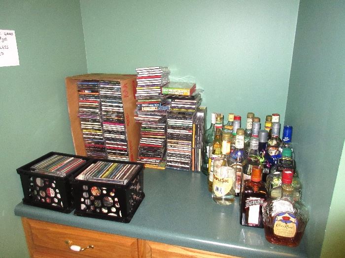 CDs and DVDs, some interesting looking bottles