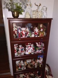 Christmas figures in a Glass Front Bookcase