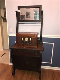 Innovative Technologies Music Center - With turntable, Recordable Cd Player, AUX plug in for Ipods, and AM/FM Radio.                                                     Antique Walnut Washstand. 