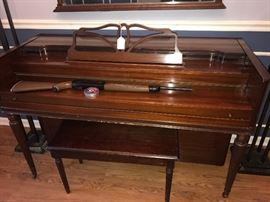 Another photo of the piano and Crosman 2200 Magnum Model 2200 .22 Cal pellet gun. 