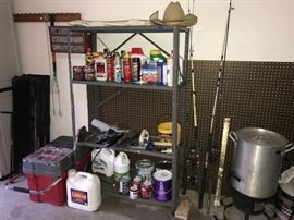 Misc garage chemicals, Turkey Fryer/Boil Pot & Burner, Set of Steel Car Ramps, Some Fishing Poles 