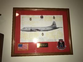 There are some 1990's naval items, pictures (framed/not framed), yearbooks, uniform 