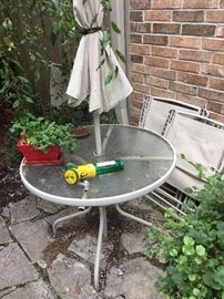 Patio table and chairs (flowers not for sale)