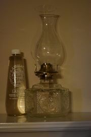 Vintage Oil Lamp with a bottle of Oil