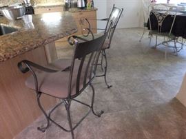 bar stools pair with padded seats