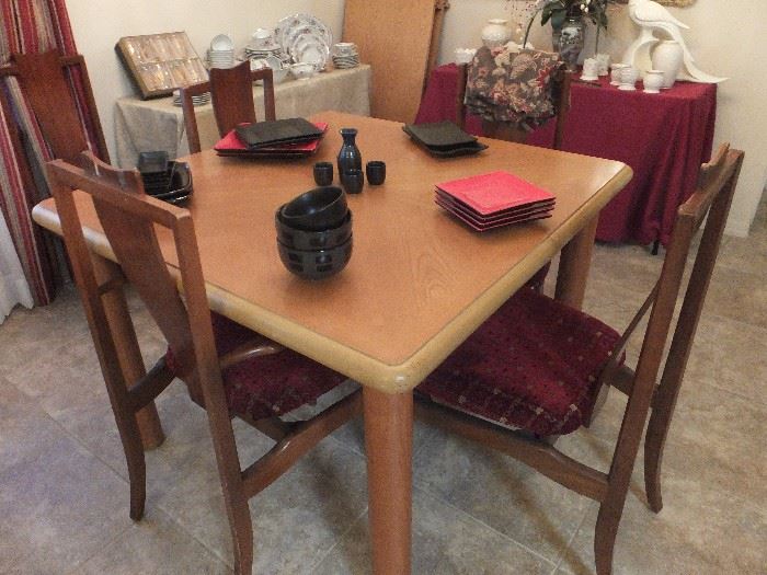 Dining table with 2 leafs - chairs do not match the table and are sold separately 
