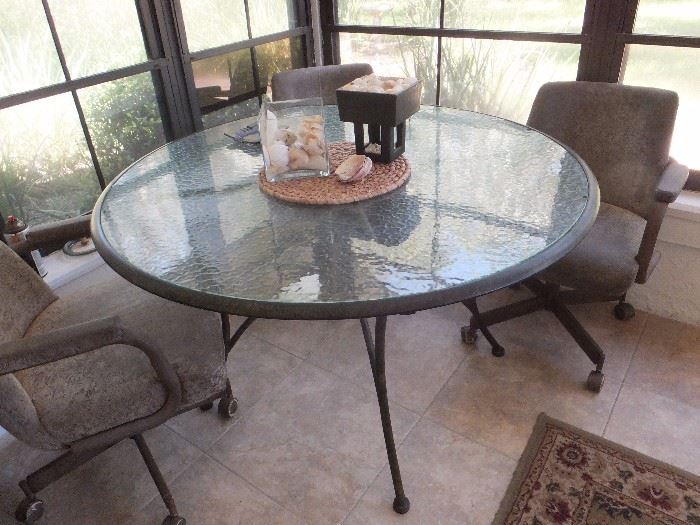 Glass/metal patio table and 3 chairs