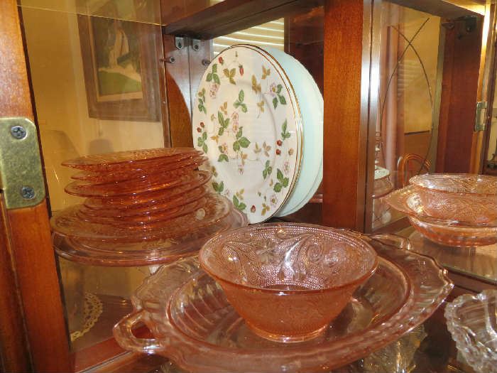 Many pieces of Depression Glass