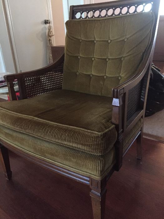 Green vintage chair with caned sides