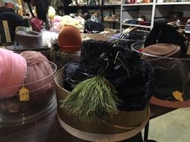 Feathers and felt and netting  hats!