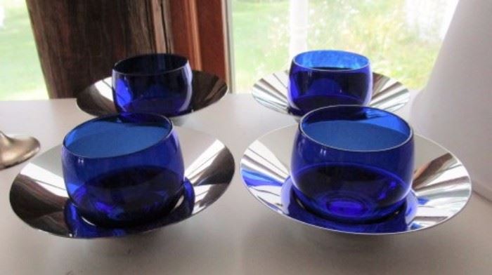 cobalt glass bowls on silver trays