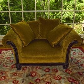 Bernhardt Furniture for Z Gallerie Chair and a Half: A plush chair and a half from Bernhardt for Z Gallerie. The chair features a loose pillow back and single seat cushion upholstered in golden tan with brass tack trim accenting padded rolled arms and mahogany stained exposed front frame. The sofa rises on bun feet. Companion sofa listed separately as item 17CIN384-014.