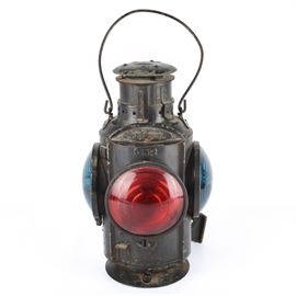 Early 20th Century Piper Montreal Railroad Lantern: An early 20th Century Piper Montreal caboose marker/lantern. The lantern has two red and two blue glass signal lights and is marked to the coal chimney “HLP” and “M” along with “Piper Montreal” along the side.