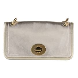 Metallic Gold Coach Handbag: A Coach bag with a metallic gold tone fabric. This purse features a top flap closure with a toggled closure, and a small matching handle that mounts the flap by two gold tone links. The back has an exterior zipper pocket. Inside the bag is lined in brightly colored striped fabric, has a side wall zipper pocket and is labeled “Coach Est. 1941”. The bag comes with a brown Coach branded drawstring dust bag.