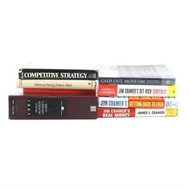 Business Book Assortment Featuring Signed Jim Cramer: An assortment of business books featuring Jim Cramer. This collection of eight books includes a signed copy of Get Rich Carefully by Jim Cramer as well as Getting Back to Even and Real Money also by Cramer. Also includes Competitive Strategy by Michael E. Porter, Swim With the Sharks by Harvey Mackay, and more.